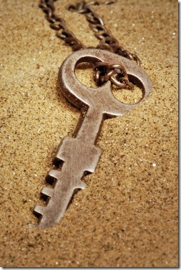 rusty key lost in sand